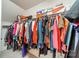 Walk-in closet featuring hanging clothes, shoes, and ample storage space at 709 Circle Trace Rd, Monroe, NC 28110