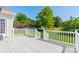 Spacious white deck overlooking a beautifully manicured yard, perfect for entertaining at 709 Circle Trace Rd, Monroe, NC 28110