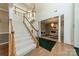 Spacious foyer featuring a staircase with wooden accents and leading into other rooms at 709 Circle Trace Rd, Monroe, NC 28110