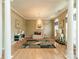 Bright sitting room with natural light, hardwood floors, neutral paint, and ornate decor at 709 Circle Trace Rd, Monroe, NC 28110