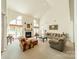 Large living room with vaulted ceiling, many windows, fireplace, and ample seating at 709 Circle Trace Rd, Monroe, NC 28110