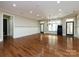 Spacious basement featuring hardwood floors and neutral walls at 7409 Stonecroft Park Dr, Charlotte, NC 28226