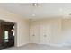 Generous bonus room offers natural light, neutral carpet and features double door access to hallway at 7409 Stonecroft Park Dr, Charlotte, NC 28226