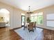 Bright dining room with large windows, perfect for Gathering gatherings at 7409 Stonecroft Park Dr, Charlotte, NC 28226