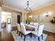 Spacious dining room with decorative wall sconces and natural light at 7409 Stonecroft Park Dr, Charlotte, NC 28226