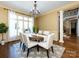 Bright dining room featuring an elegant chandelier and large windows at 7409 Stonecroft Park Dr, Charlotte, NC 28226