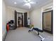 Home gym boasts exercise equipment, ample space, and natural lighting for effective workouts at 7409 Stonecroft Park Dr, Charlotte, NC 28226