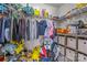 Walk-in closet with shelves, hanging rods, and ample storage space at 7693 Lazy Hollow Ln, Denver, NC 28037