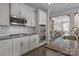Gourmet kitchen featuring stainless steel appliances, granite countertops, and custom cabinetry at 7693 Lazy Hollow Ln, Denver, NC 28037