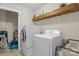 Laundry room featuring modern appliances at 7693 Lazy Hollow Ln, Denver, NC 28037