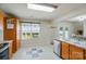 Kitchen featuring oak cabinets, stainless steel appliances, granite counters, and breakfast nook with bright window at 773 Sir Raleigh Dr, Concord, NC 28025
