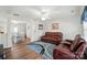 Bright living room featuring hardwood floors, comfortable seating and natural light at 773 Sir Raleigh Dr, Concord, NC 28025