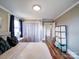 Bedroom with hardwood floors, fresh paint, closet, and attached storage at 8475 Nc 49 N Hwy, Mount Pleasant, NC 28124