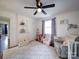 Bedroom boasting hardwood floors, fresh paint, window, and white chest at 8475 Nc 49 N Hwy, Mount Pleasant, NC 28124