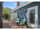 Inviting back deck area with a storage shed, seating for two, and access to the home at 8651 Walsham Dr, Charlotte, NC 28277