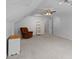 Large bonus room with a fan, overhead lighting, and neutral carpeting at 8651 Walsham Dr, Charlotte, NC 28277
