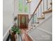 Grand foyer with a staircase and hardwood floors at 8651 Walsham Dr, Charlotte, NC 28277