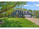 Charming two-story home with a well-manicured lawn and inviting curb appeal at 8651 Walsham Dr, Charlotte, NC 28277