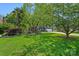 Beautiful home with a spacious front yard with mature trees at 8651 Walsham Dr, Charlotte, NC 28277
