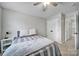 Relaxing bedroom featuring a bed, a ceiling fan, neutral walls, carpet, and a white night stand at 901 Heritage Pkwy, Fort Mill, SC 29715