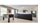 Spacious basement with comfortable seating area and space for recreation, perfect for entertaining at 985 Angelica Ln, Tega Cay, SC 29708