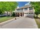 Exterior of a two-story home with a spacious front yard and attached three-car garage at 985 Angelica Ln, Tega Cay, SC 29708