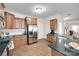Well-equipped kitchen with granite countertops, stainless steel appliances, and ample cabinet space at 985 Angelica Ln, Tega Cay, SC 29708