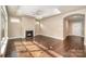 Spacious living room boasts hardwood floors, recessed lighting, a fireplace, and open layout at 1008 Avalon Pl, Matthews, NC 28104