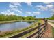Scenic pond featuring a fountain, lush surroundings, and a tranquil atmosphere at 1008 Avalon Pl, Matthews, NC 28104
