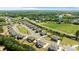 Panoramic aerial view of the community, showing well-spaced homes and surrounding green spaces at 1052 Harlow'S Crossing Dr, Weddington, NC 28104