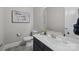 Stylish half bathroom with patterned tile floor, modern vanity with white countertop, and gray walls at 1052 Harlow'S Crossing Dr, Weddington, NC 28104