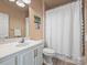 Neutral bathroom featuring a vanity, sink and faucet, commode and shower at 1123 Park West Dr, Charlotte, NC 28209