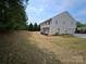 Exterior view of home and expansive yard at 11922 Kimberfield Rd # 37, Matthews, NC 28105