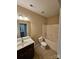 Neutral bathroom featuring shower and tub combo and a dark wood vanity at 11922 Kimberfield Rd # 37, Matthews, NC 28105