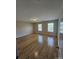 Spacious bedroom with hardwood floors and natural light at 11922 Kimberfield Rd # 37, Matthews, NC 28105
