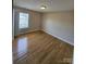 Bright bedroom featuring natural light and hardwood floors at 11922 Kimberfield Rd # 37, Matthews, NC 28105
