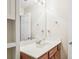 Bathroom features a large mirror, vanity, and shelving for storage at 12027 Stratfield Place Cir, Pineville, NC 28134