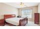 Bedroom with a comfortable bed and a view of the outside through a bright window at 12027 Stratfield Place Cir, Pineville, NC 28134