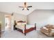 Spacious bedroom with a vaulted ceiling, ceiling fan, and an adjoining door to another room at 12027 Stratfield Place Cir, Pineville, NC 28134