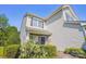 Well-maintained townhouse with tidy landscaping, partial brick facade, and an attached one-car garage at 12027 Stratfield Place Cir, Pineville, NC 28134