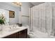 Full bathroom featuring a shower, a vanity with a sink, and a toilet at 127 N Tryon St # 301, Charlotte, NC 28202