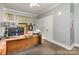 Well-lit office featuring natural light, multiple windows, neutral tones, and a ceiling fan at 127 N Tryon St # 301, Charlotte, NC 28202