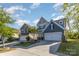 Beautiful two-story home with well manicured lawn and long driveway leading to the two car garage at 1313 Loggerhead Dr, Lancaster, SC 29720