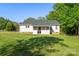 Back view of home featuring a large yard at 1325 Red Oaks Dr, Rock Hill, SC 29730