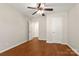 Bedroom with hardwood floors, ceiling fan, and closet at 1325 Red Oaks Dr, Rock Hill, SC 29730