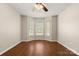 Bright bedroom with hardwood floors, neutral walls, and bay window at 1325 Red Oaks Dr, Rock Hill, SC 29730