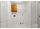 Laundry room with tile floors, cabinet, and shelving at 1325 Red Oaks Dr, Rock Hill, SC 29730