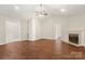 Spacious living room boasts vaulted ceilings, fireplace, and flows into other areas of the home at 1325 Red Oaks Dr, Rock Hill, SC 29730