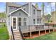 Back exterior view of home featuring a deck with furniture and easy access to the backyard at 137 Brawley Woods Ln, Mooresville, NC 28115