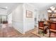 Dining room with wood flooring, wainscoting, and access to the kitchen at 137 Brawley Woods Ln, Mooresville, NC 28115